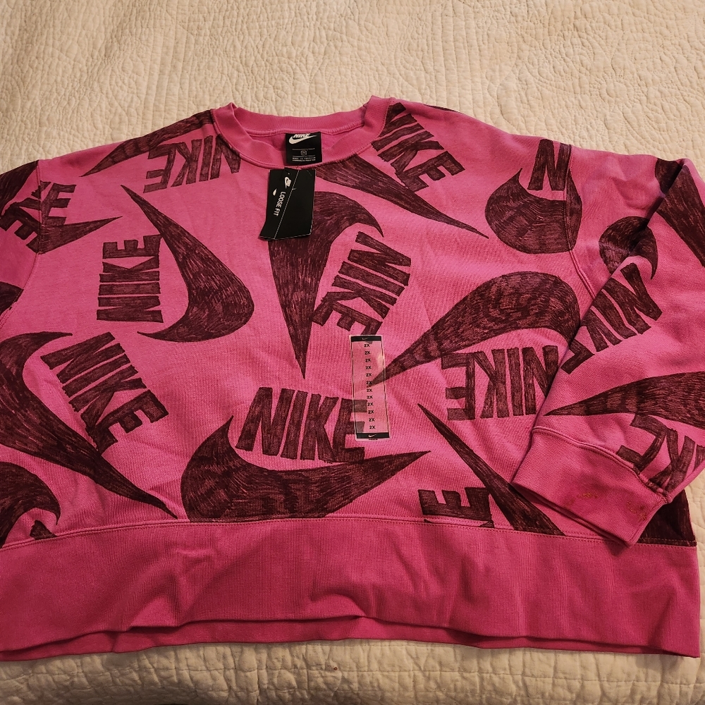 Nike 2x women's. Loose fit sweatshirt top. New With Tag